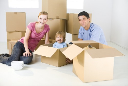 Professional movers handling boxes and household items in Lamorbey