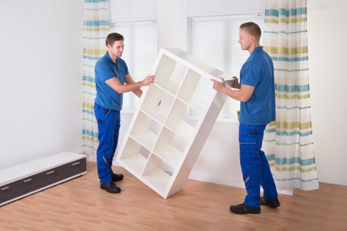 Careful loading of furniture and appliances into a removal van