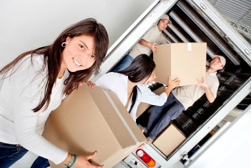 Team managing safe access and loading at a property
